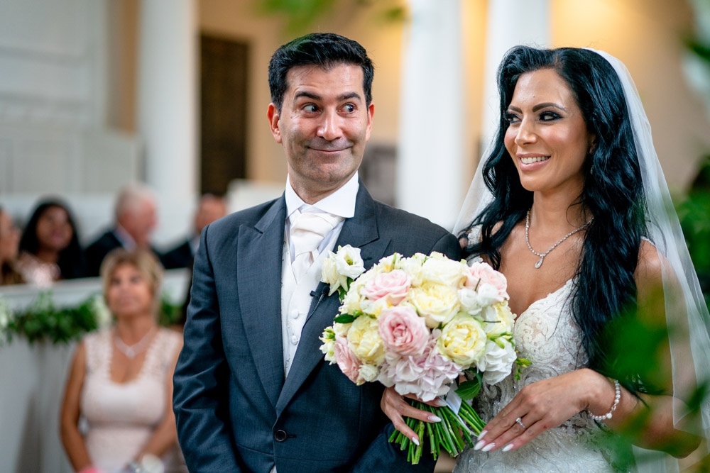 bride and groom laughing 