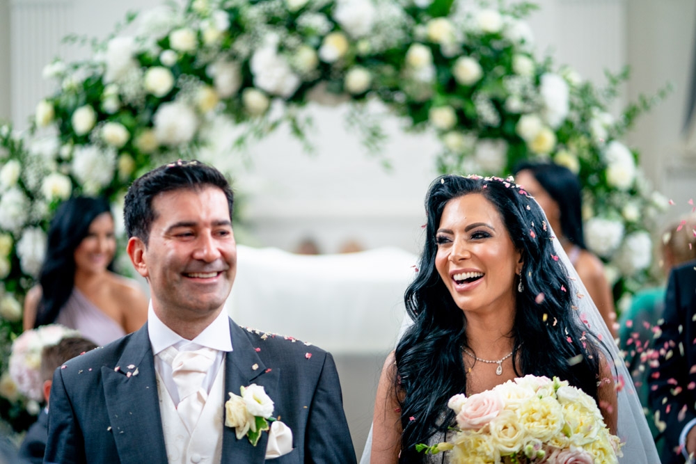 bride and groom laughing 