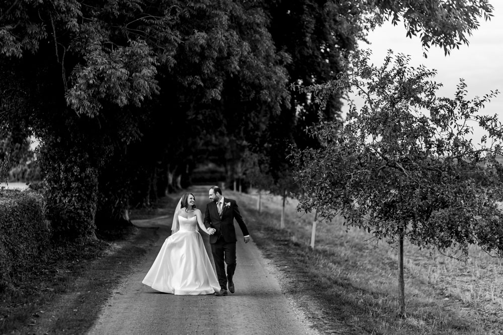 bride and groom walking together 
