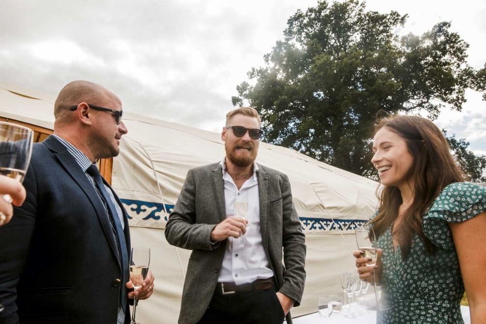 shot of wedding guests enjoying their day