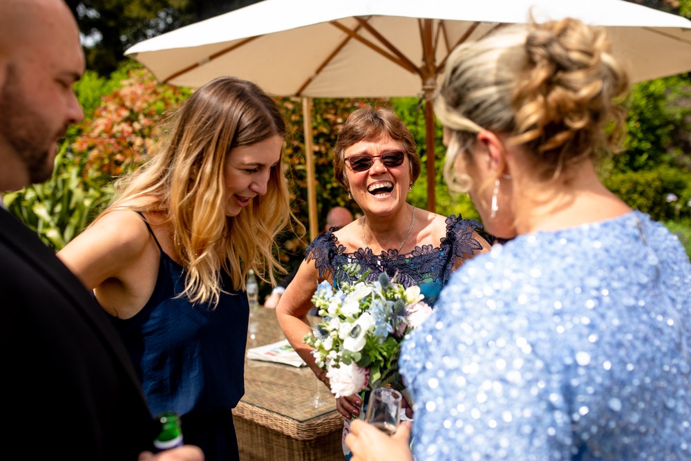 wedding guests laughing