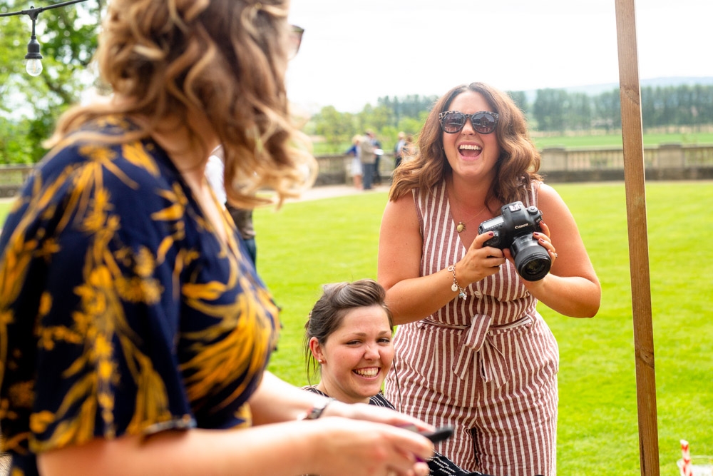 wedding guests laughing