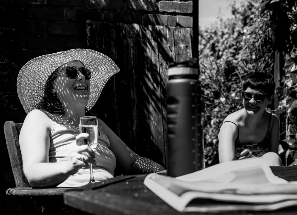 Bridesmaid rwlaxing in the sun