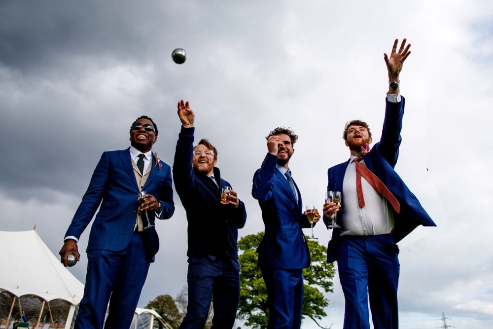 wedding guests playing the garden games