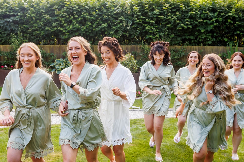 bridal party all laughing 