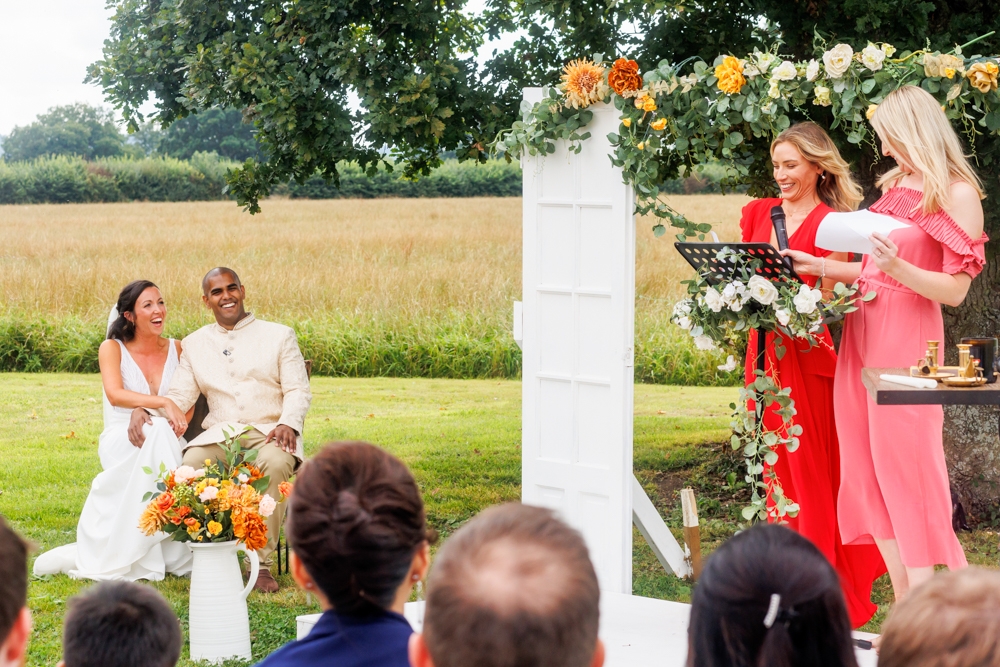 guest giving speeches to bride and groom 