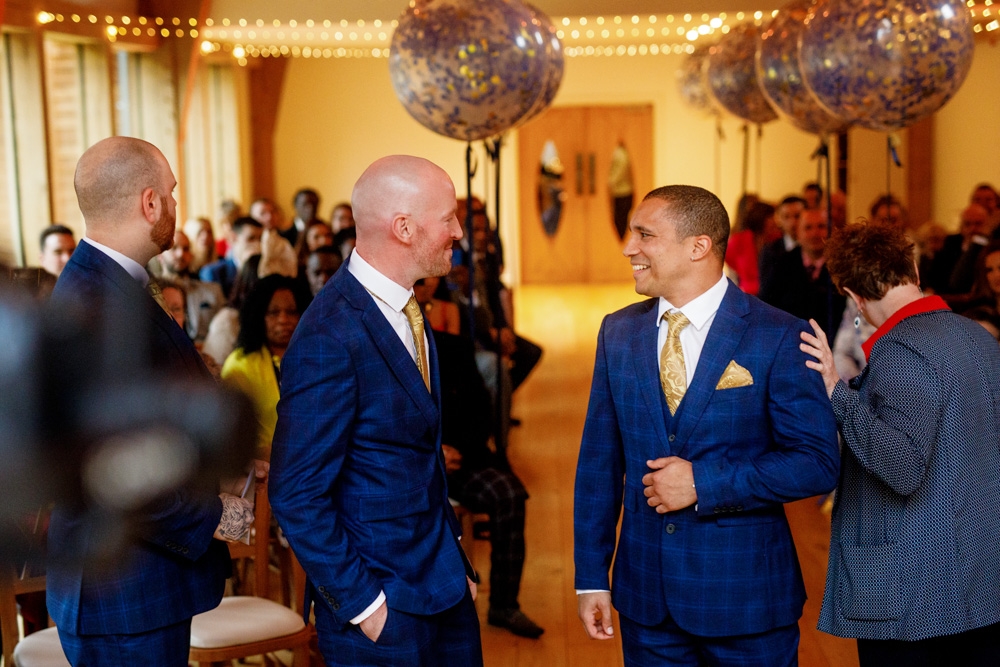 groom waiting at the isle