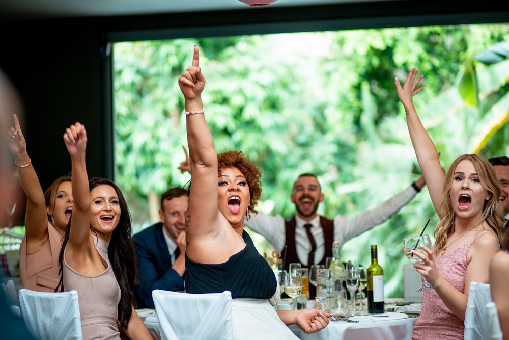 guests cheering during speeches