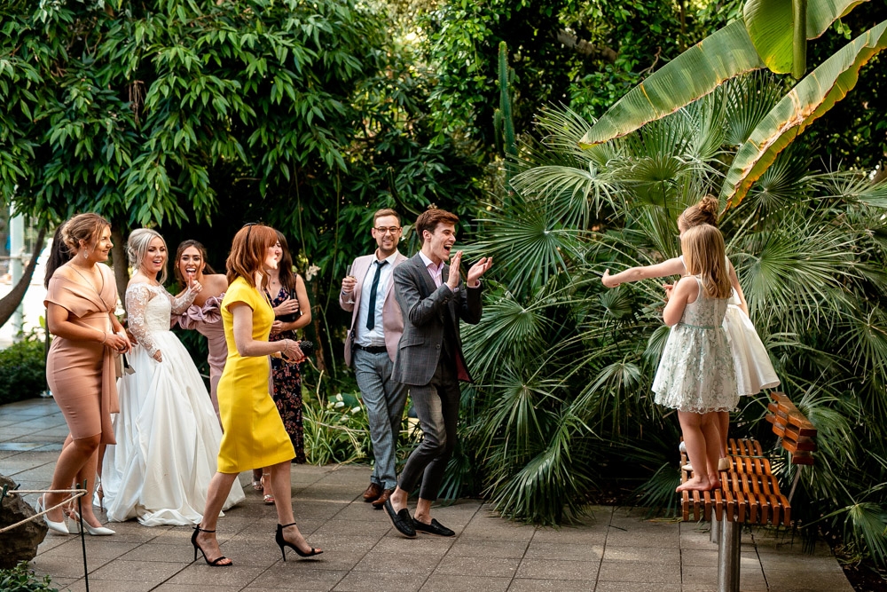 wedding guests having fun and laughing 