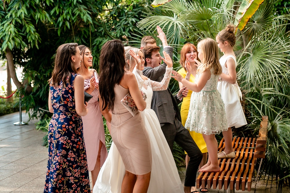 wedding guests having fun and laughing 