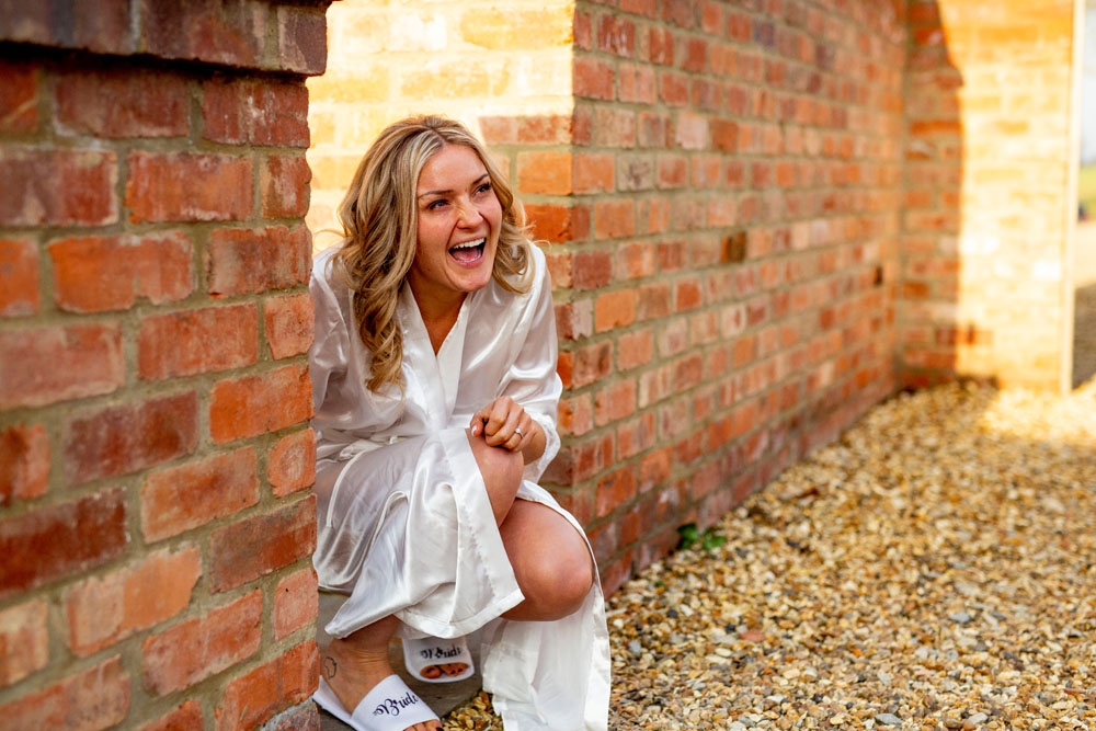 Bride and best friend laughing