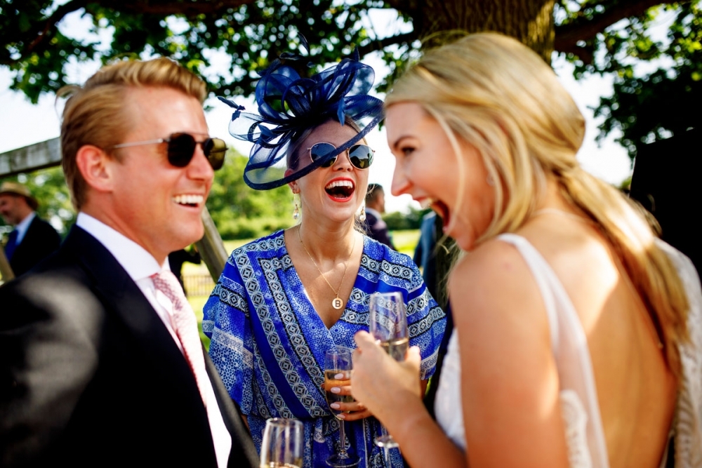 wedding guests laughing