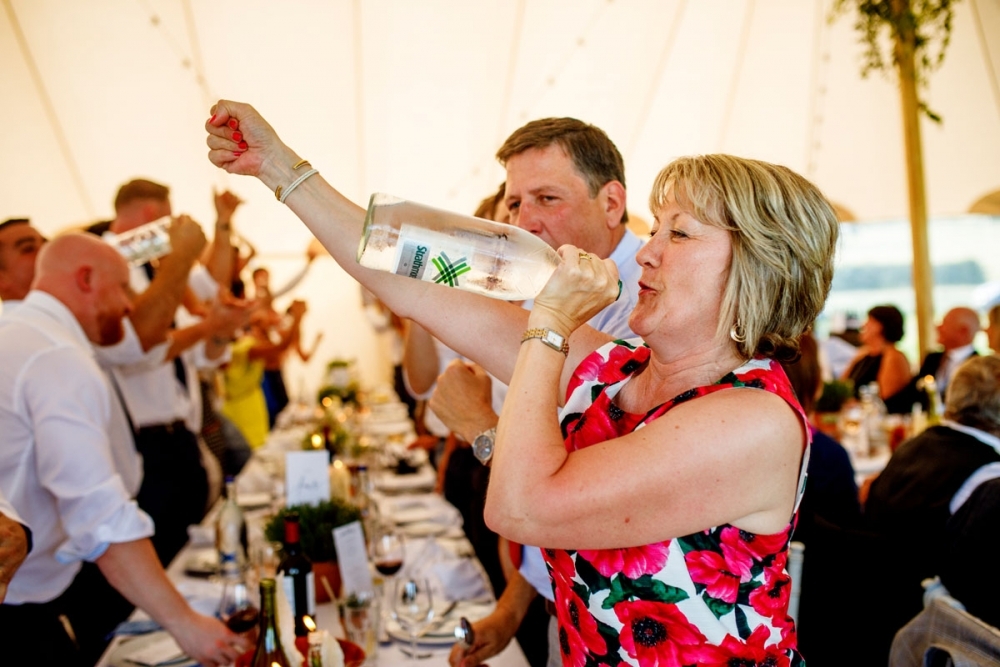 wedding guests laughing