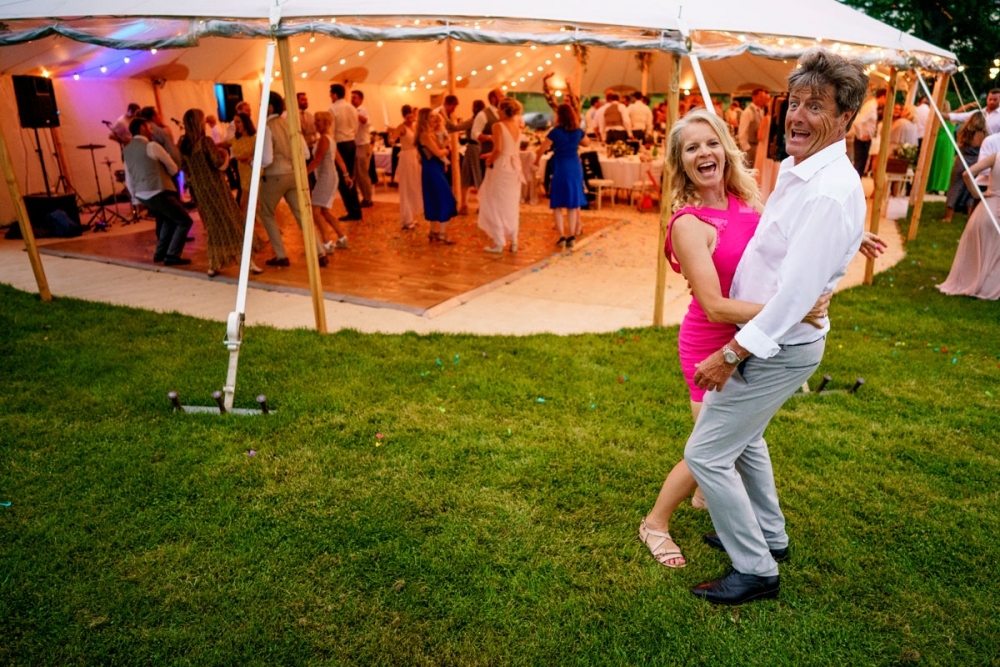 wedding guests laughing