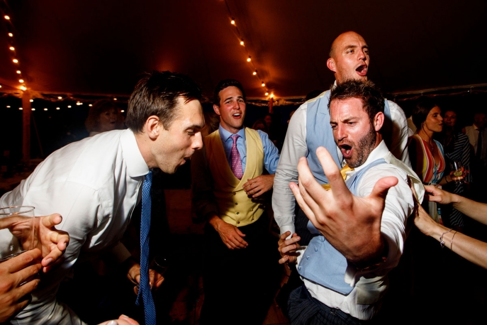 wedding guests laughing