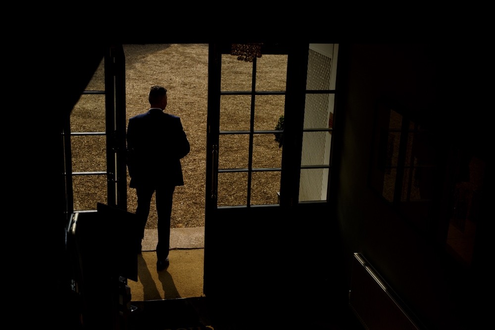 groom waiting for the guests