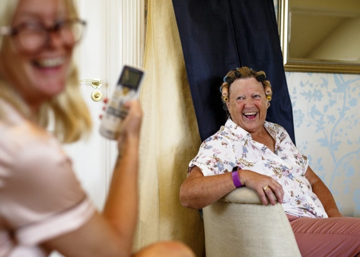 mum and bridesmaid laughing